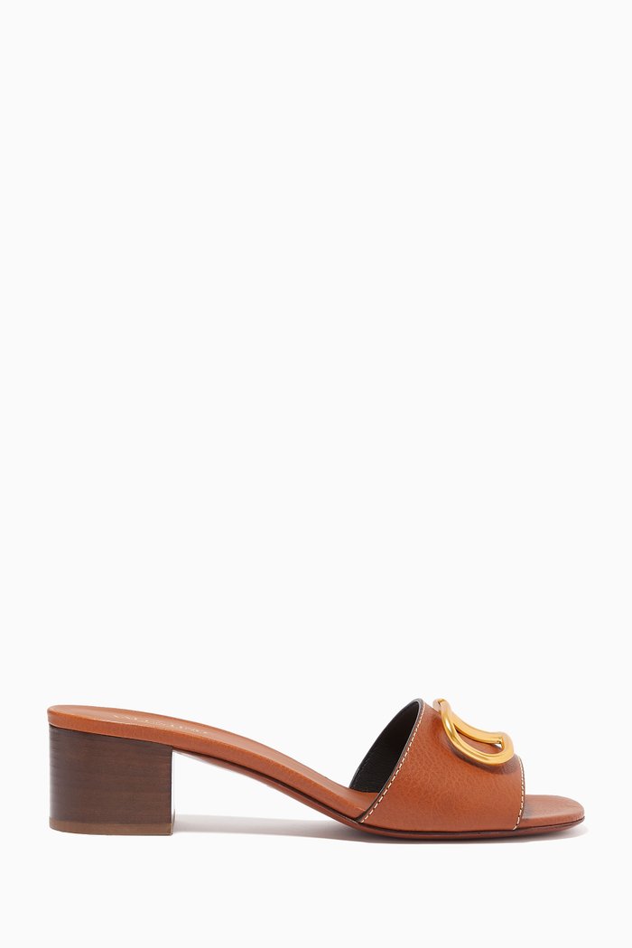 

Valentino Garavani VLOGO Mule Sandals in Grainy Leather, Brown