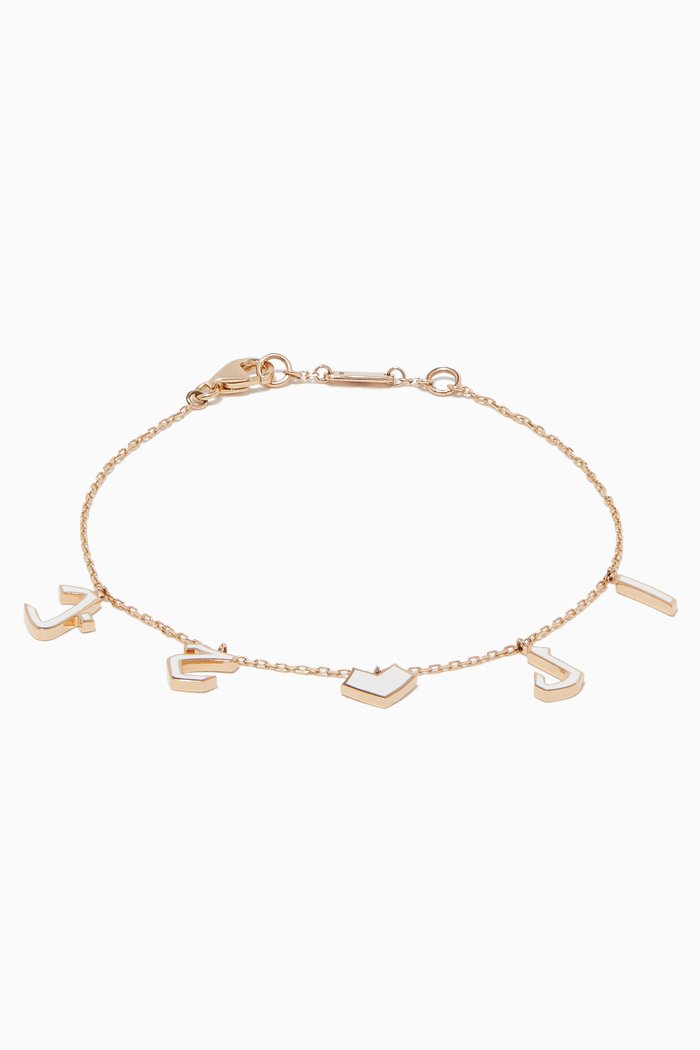 

Yellow Gold & White Enamel Al Hobb Charm Bracelet