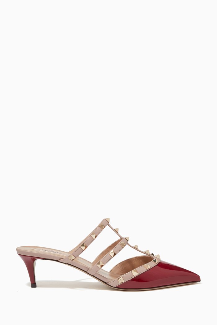 

Valentino Garavani Rockstud Mules in Patent & Calfskin Leather, Burgundy