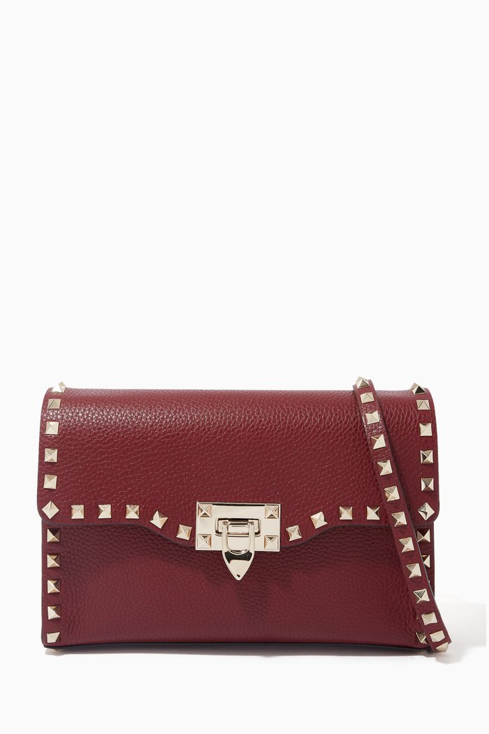 Valentino Garavani Small Rockstud Crossbody Bag in Grainy Leather, Red