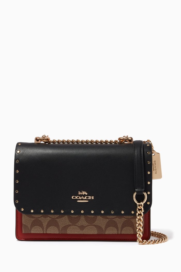 

Klare Crossbody in Signature Canvas with Rivets, Neutral