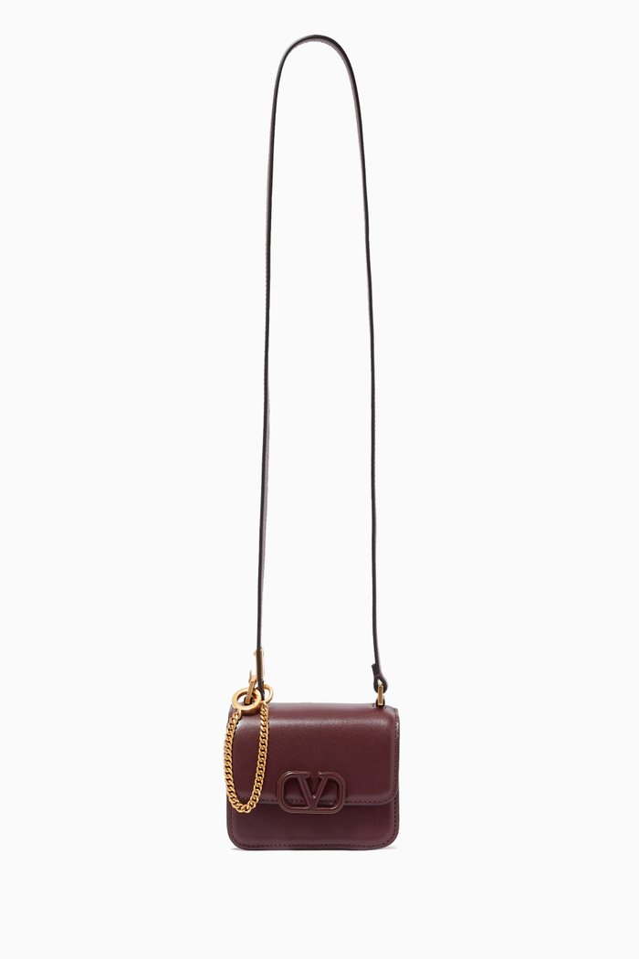 

Valentino Garavani Micro VSLING Shoulder Bag in Shiny Leather, Burgundy