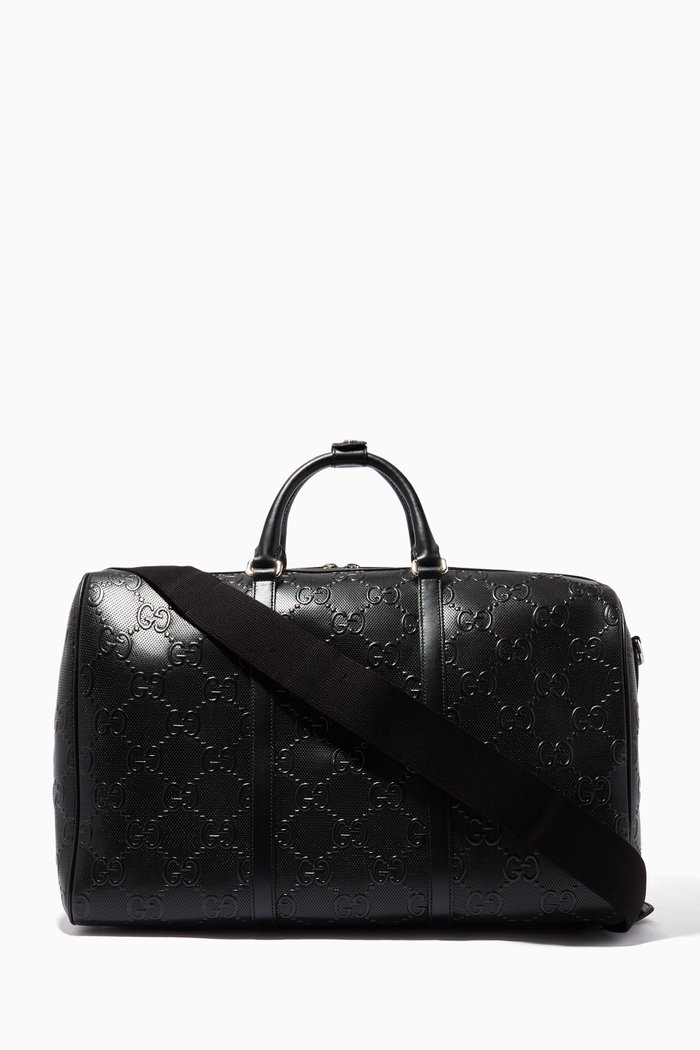 

GG Embossed Duffle Bag in Leather, Black