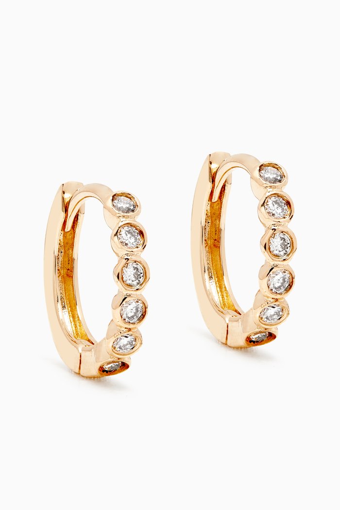

Diamond Bezel Huggies in 14kt Yellow Gold