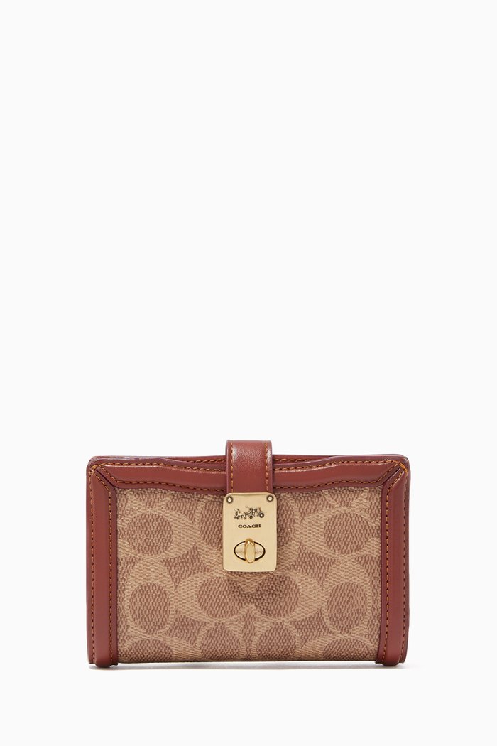 

Hutton Wallet in Signature Canvas & Calf Leather, Brown