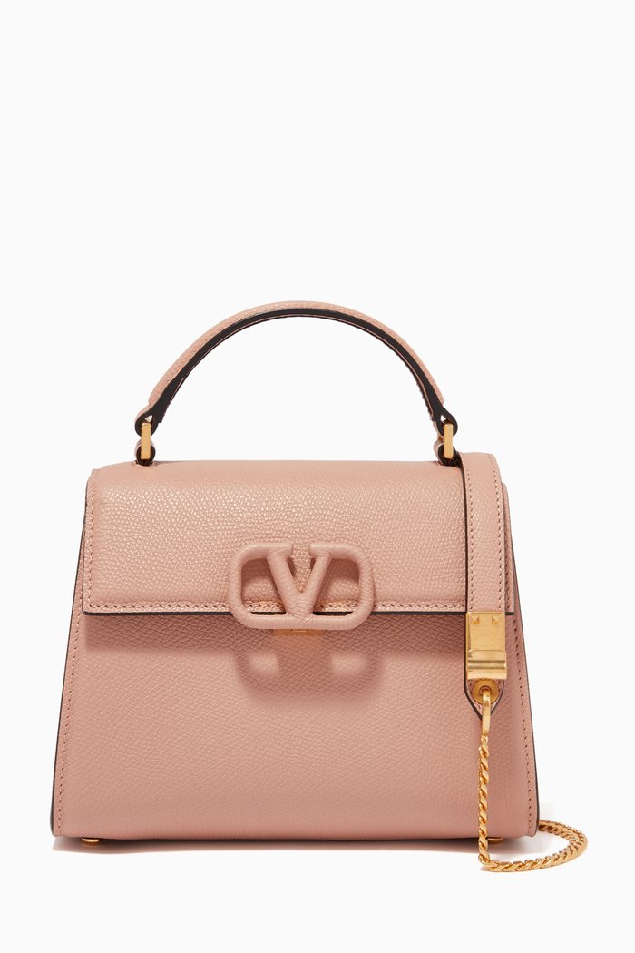 

Valentino Garavani Mini VSLING Handbag in Grainy Calfskin, Pink