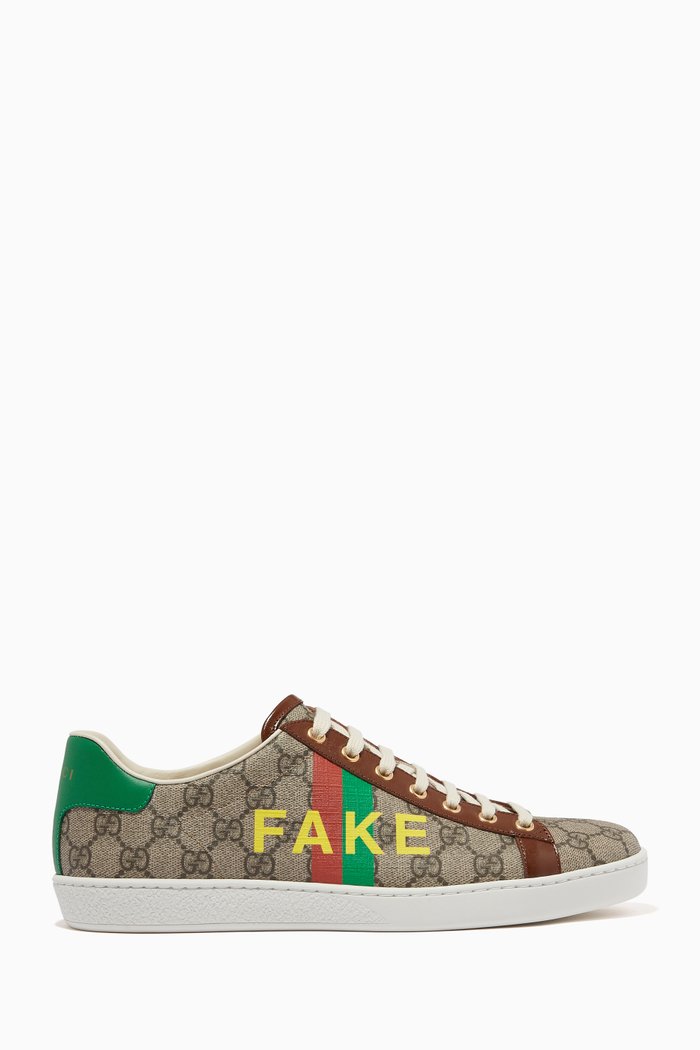 

'Fake/Not' Print Ace Sneakers in GG Supreme Canvas, Brown