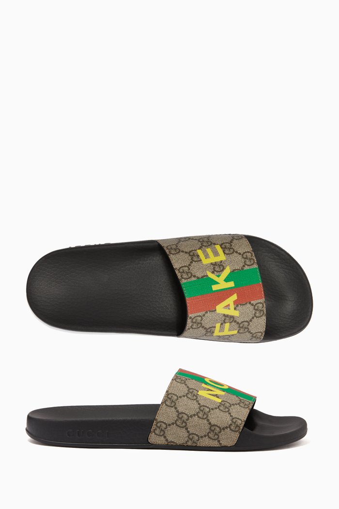 

'Fake/Not' Print Slide Sandals in GG Supreme canvas, Brown