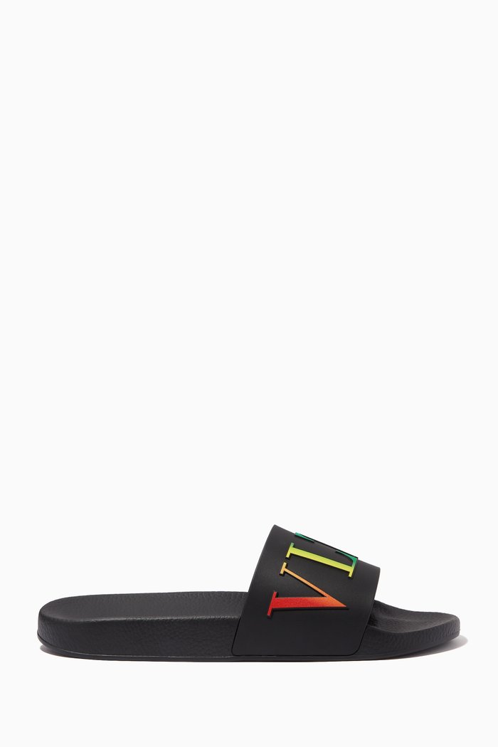 

Valentino Garavani VLTN Slide Sandals in Rubber, Black