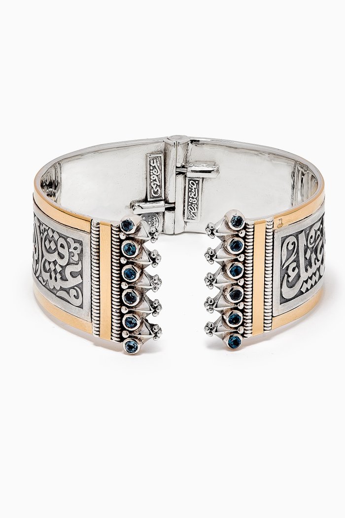 

Classic Bangle with Topaz in 18kt Gold and Sterling Silver