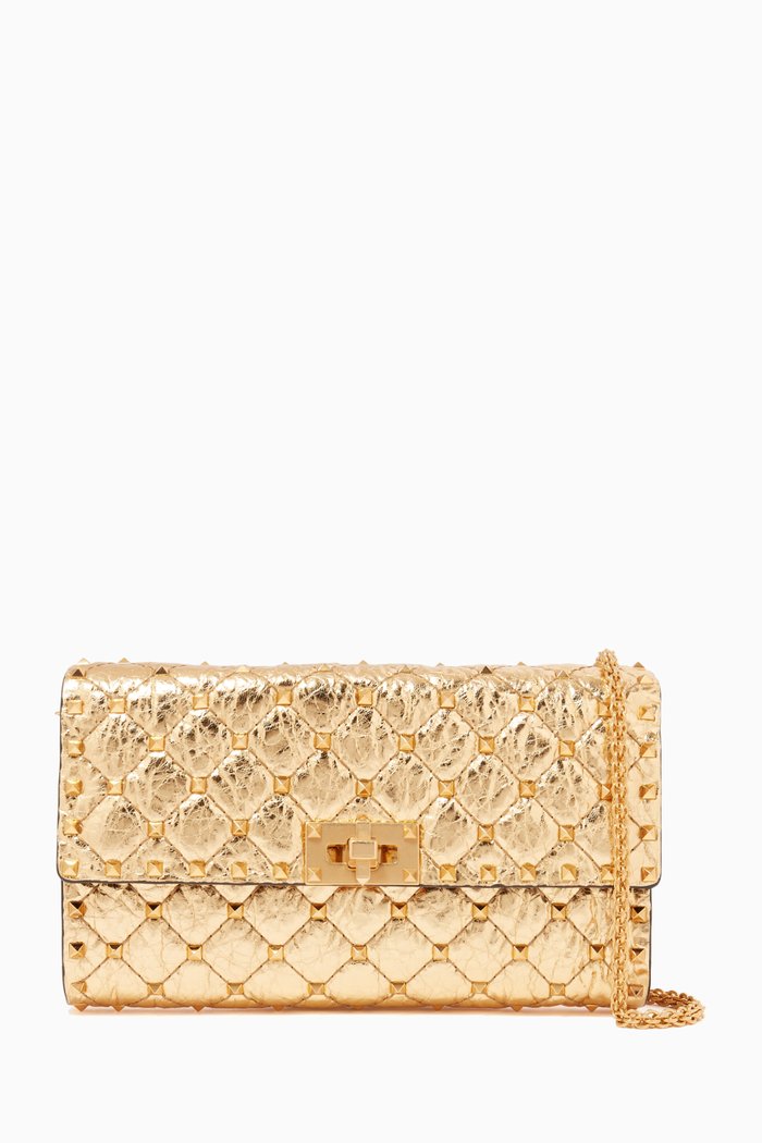 

Valentino Garavani Small Rockstud Spike Crossbody Clutch Bag in Metallic Nappa, Gold