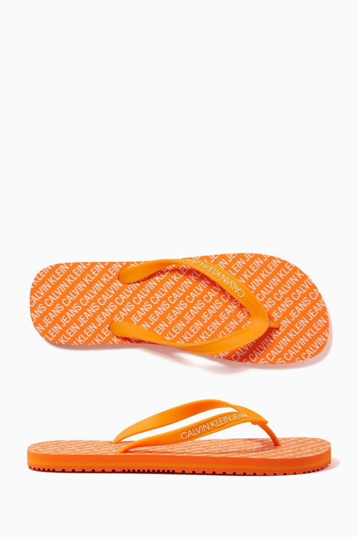 

CK Logo Flip Flops in Rubber, Orange