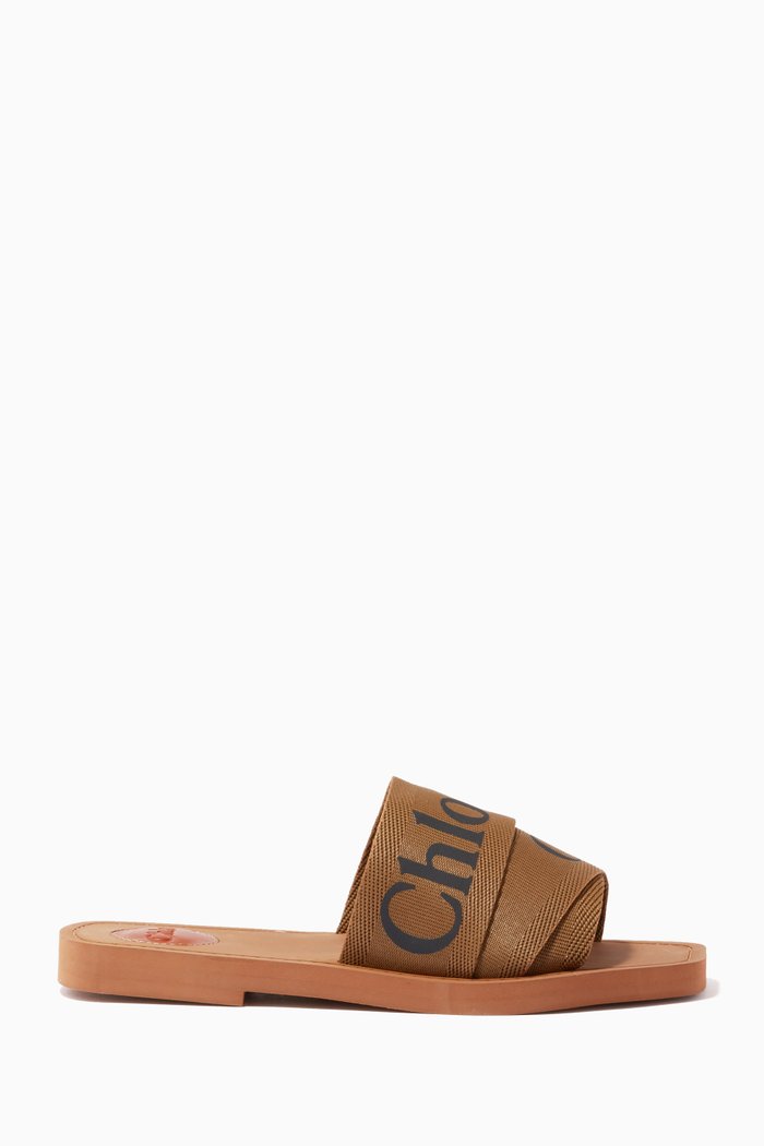 

Woody Flat Mules in Canvas, Brown