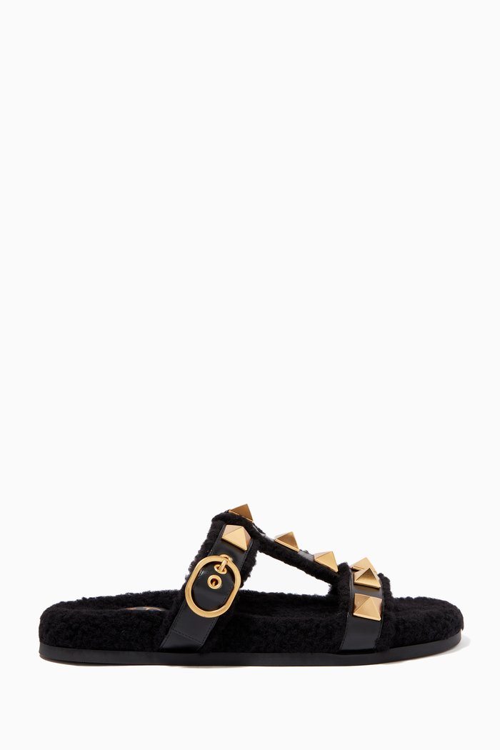 

Valentino Garavani Roman Stud Flats in Calfskin & Shearling, Black