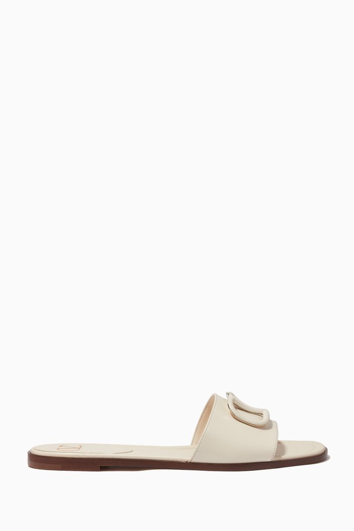 

Valentino Garavani VLOGO Flat Slides in Calfskin, White