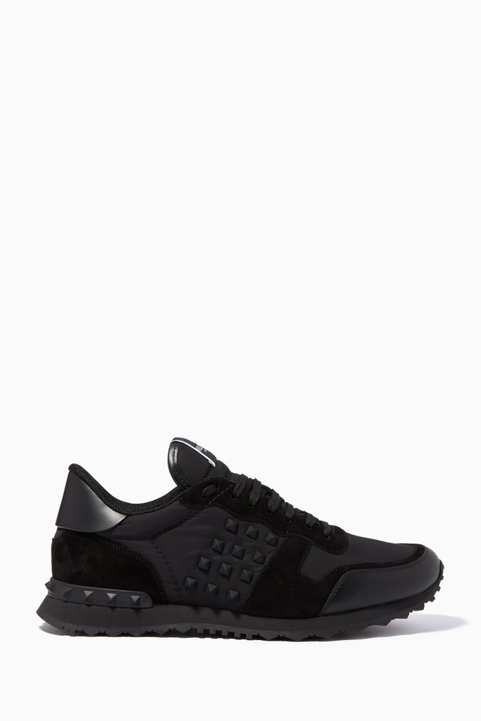 

Valentino Garavani Rockrunner Sneakers in Leather & Suede, Black