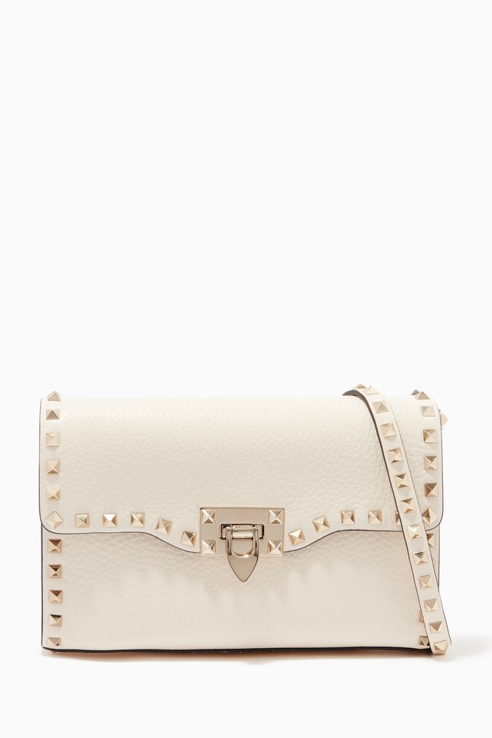 

Valentino Garavani Small Rockstud Crossbody Bag in Grainy Leather, White