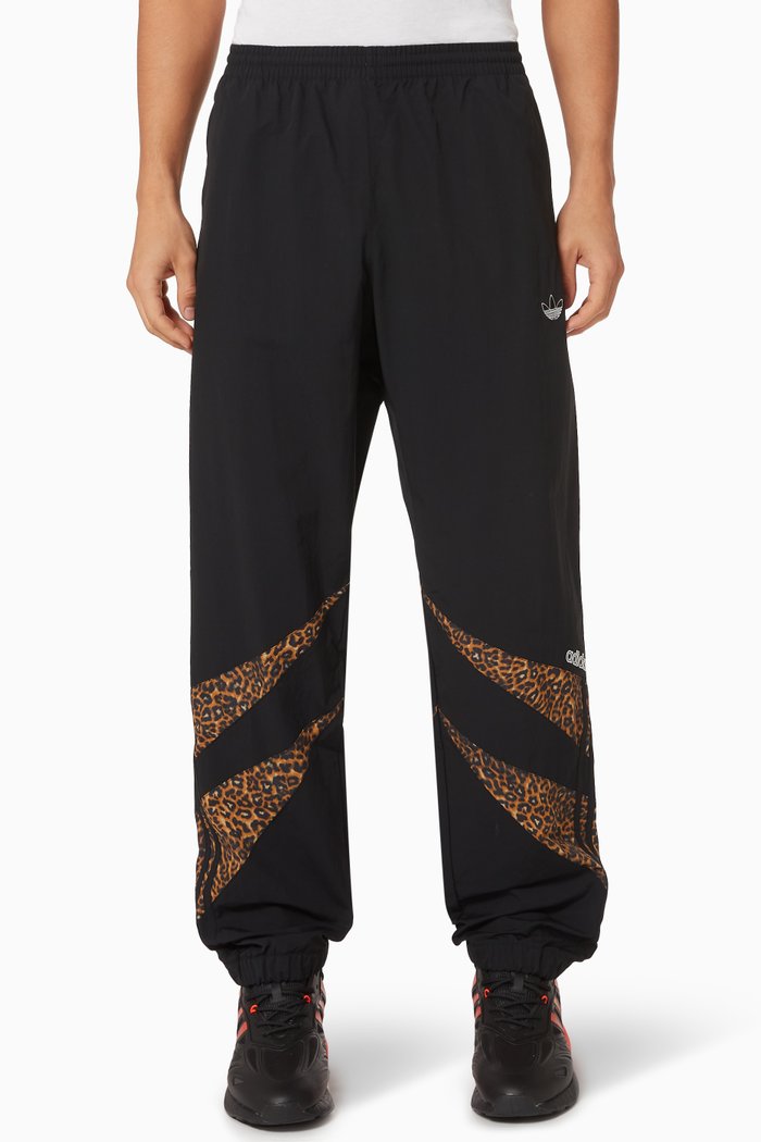 

SPRT Animal Print Track Pants in Nylon, Black
