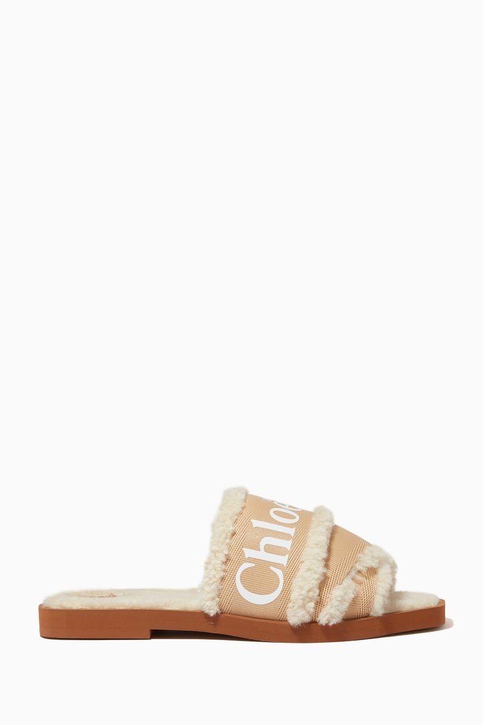 

Woody Flat Mules in Canvas & Shearling, Brown
