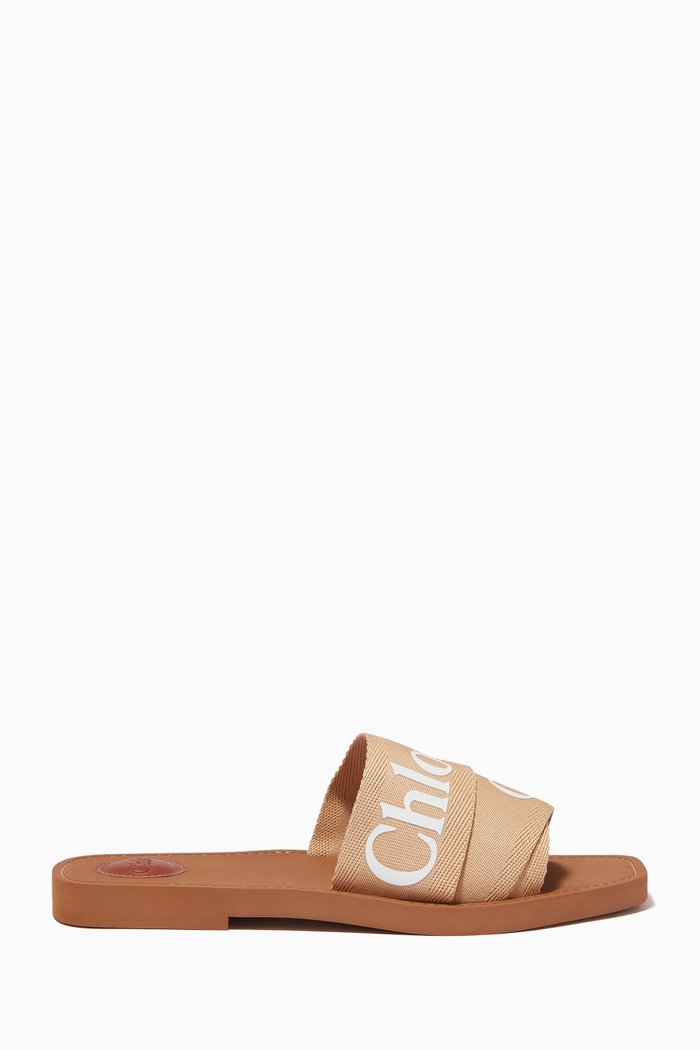 

Woody Flat Mules in Canvas, Brown