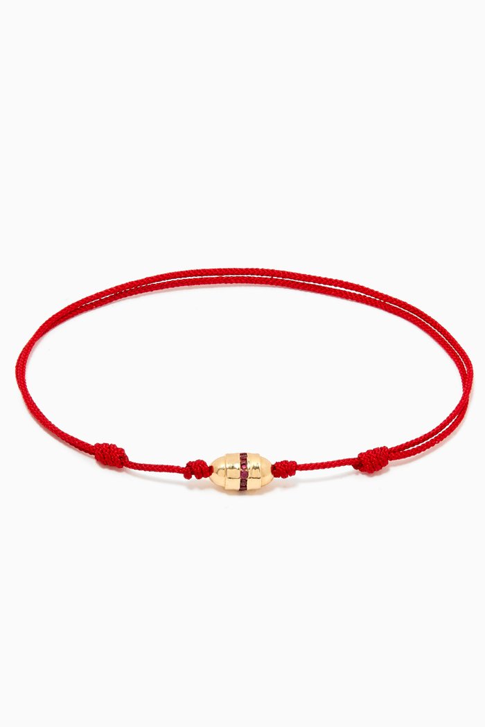 

Small Round Bolt with Rubies on Cord Bracelet in 14kt Yellow Gold, Red