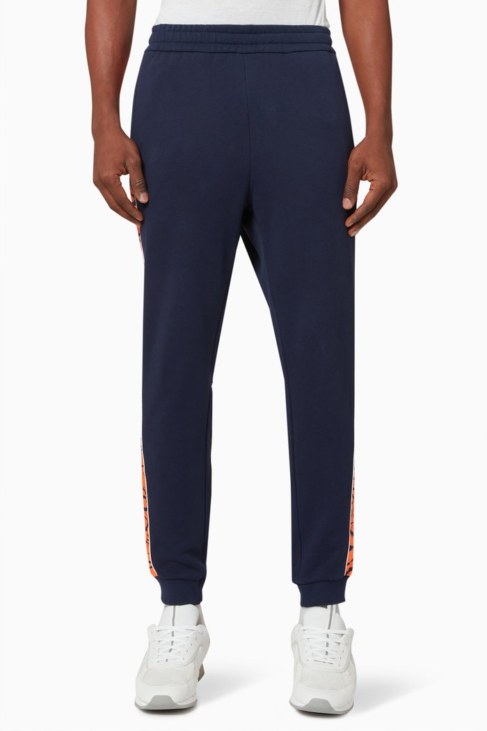 

EA7 Train Graphic Series Sweatpants in Jersey, Blue