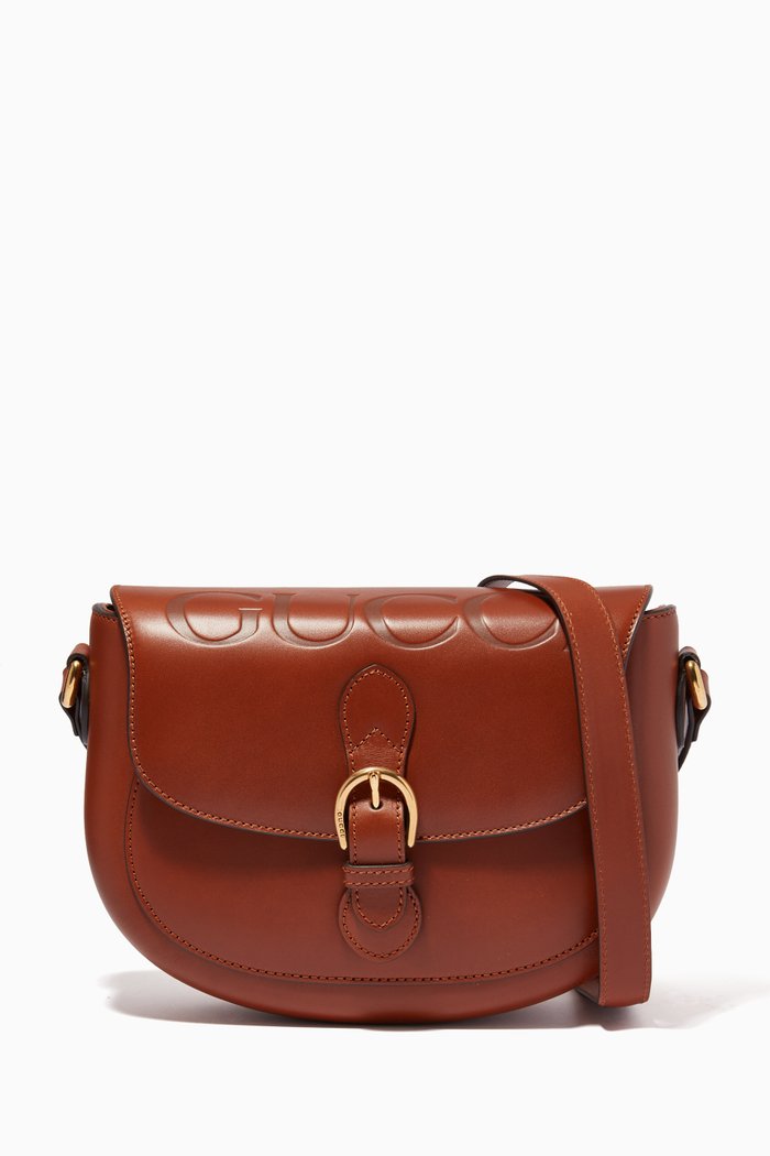 

Embossed Logo Saddle Bag in Leather, Brown