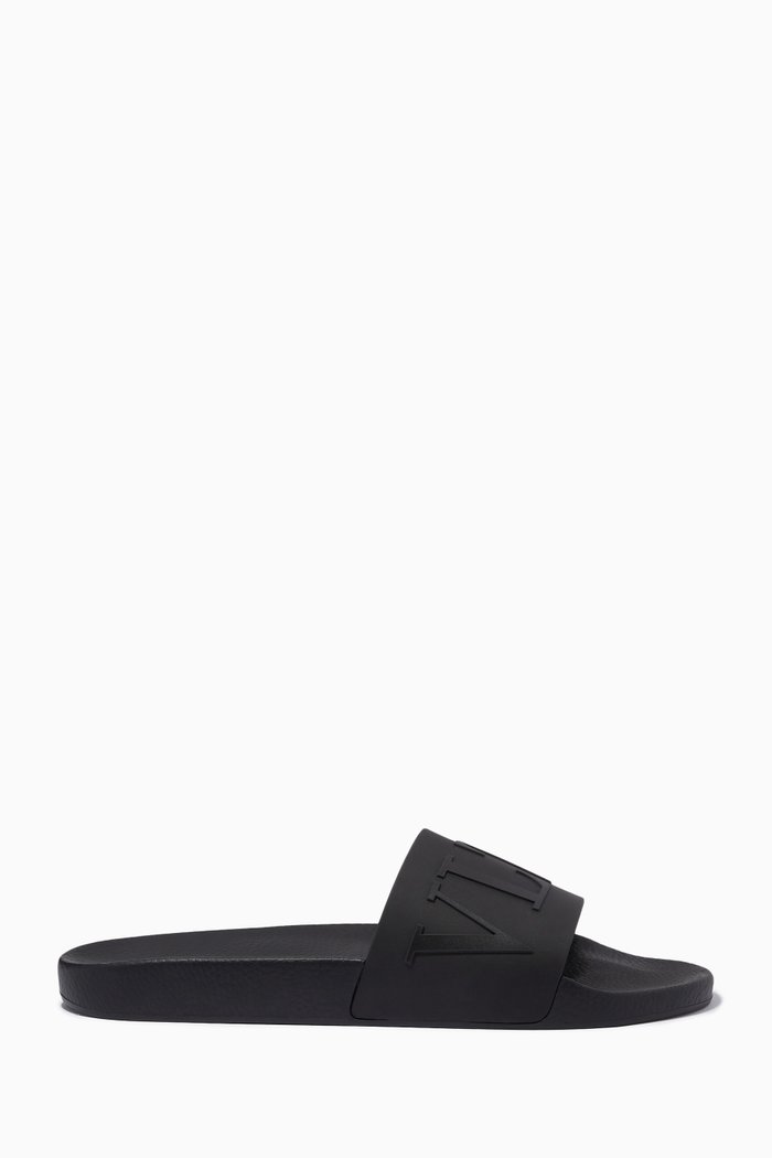 

Valentino Garavani VLTN Slide Sandals in Rubber, Black