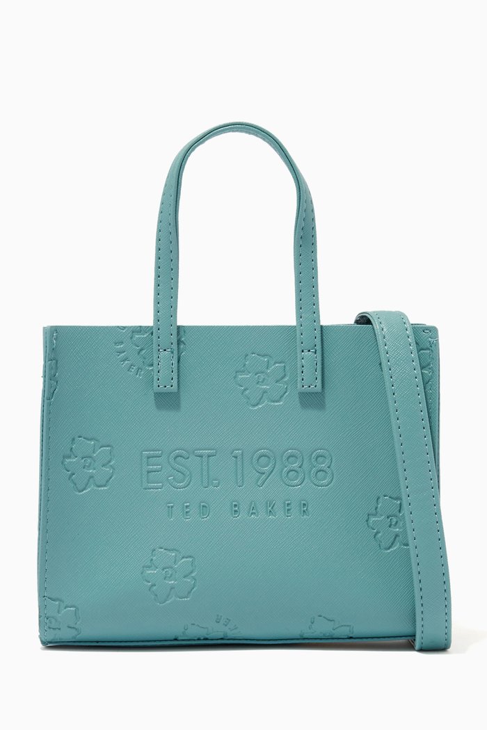 

Madacon Mini EW Icon Bag in Floral Debossed Saffiano Vinyl, Blue