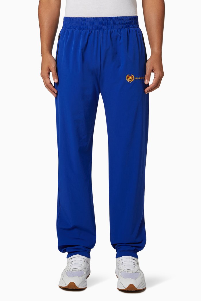 

Embroidered Academy Logo Track Pants in Nylon, Blue