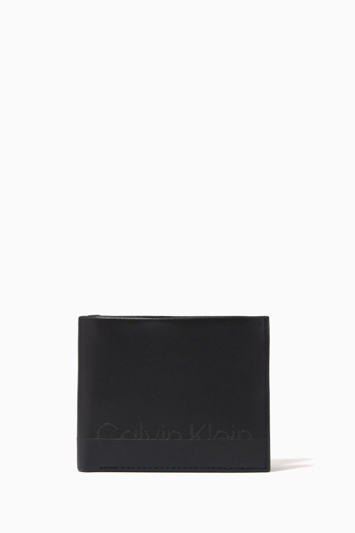 

CK Logo Embossed Bi-fold Wallet in Leather, Black