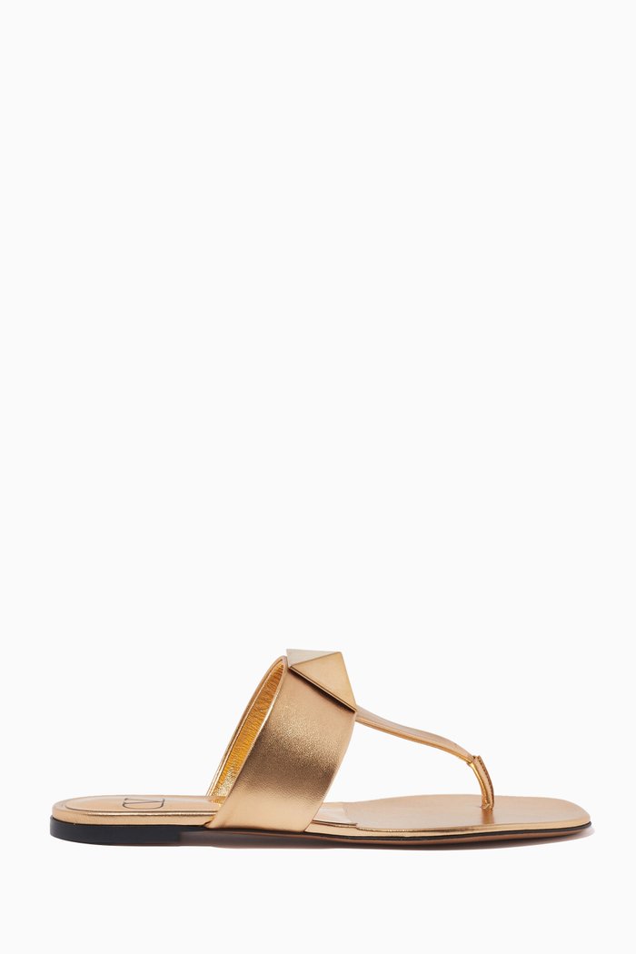 

Valentino Garavani One Stud Thong Slides in Metallic Leather, Gold