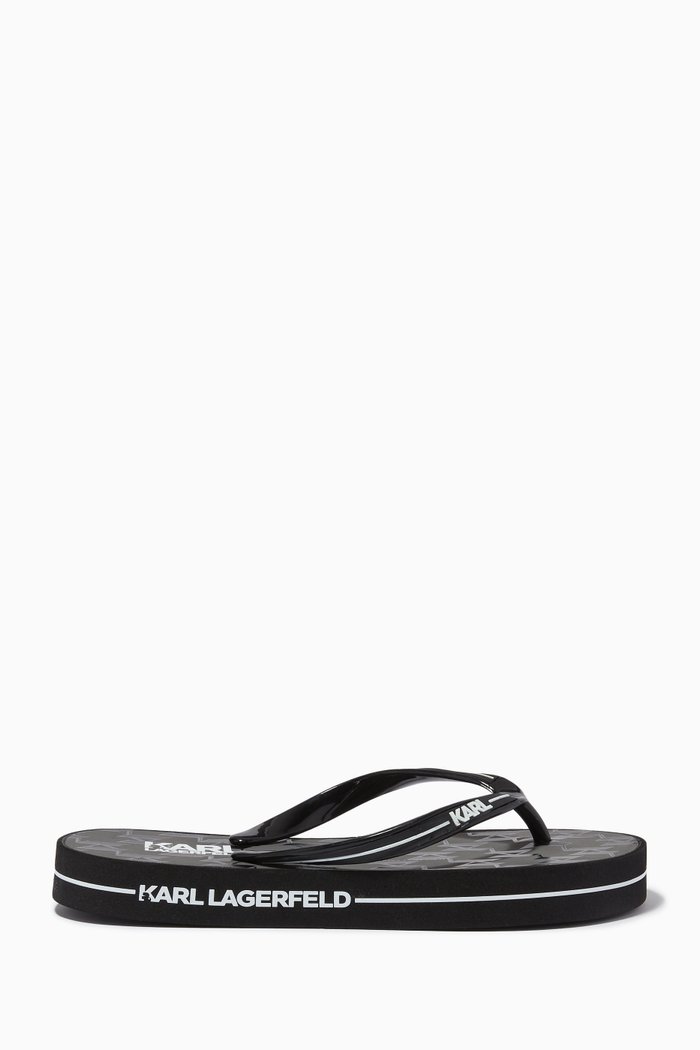Kosta Monogram Thong Sandals in Rubber, Black