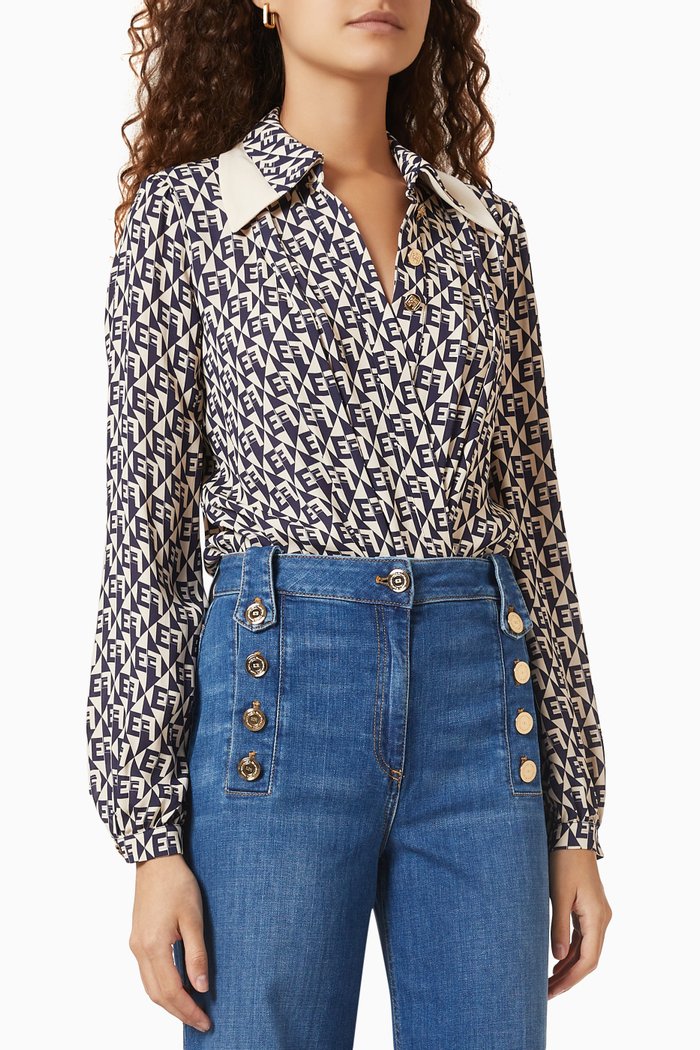 

Crossover Bodysuit-style Shirt in Diamond-print Georgette, Blue