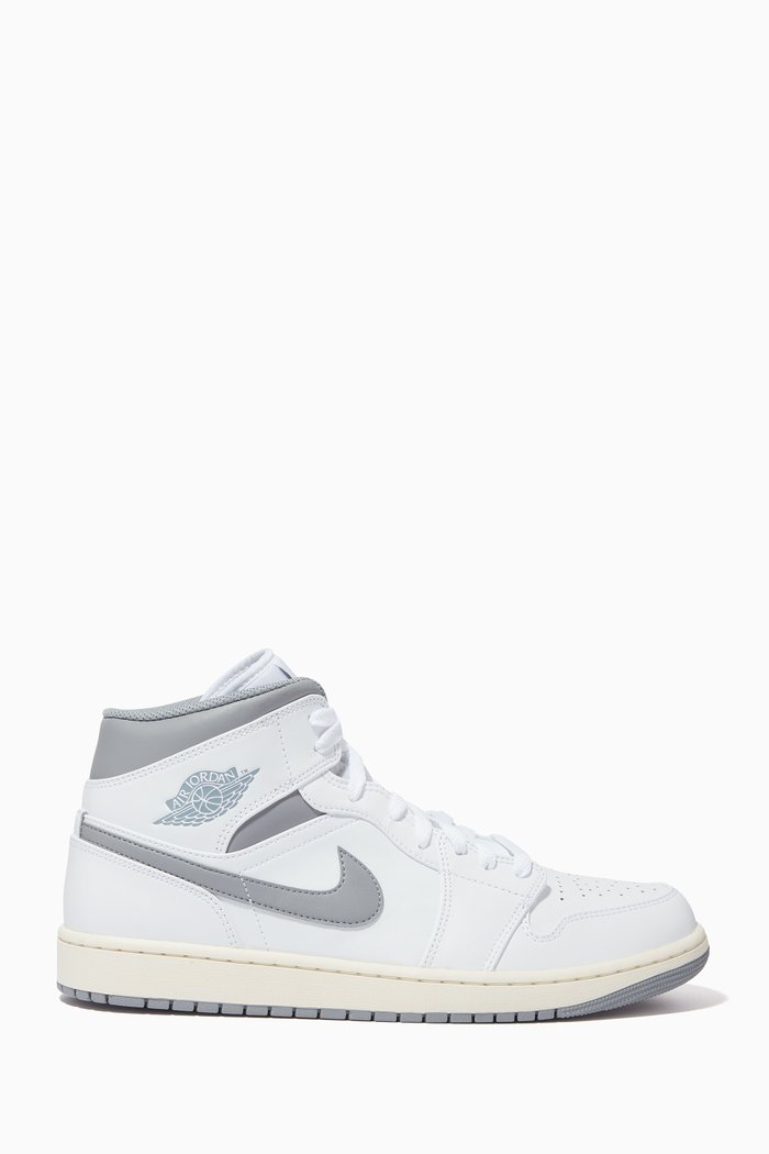 

Air Jordan 1 Mid-top Sneakers in Leather, White