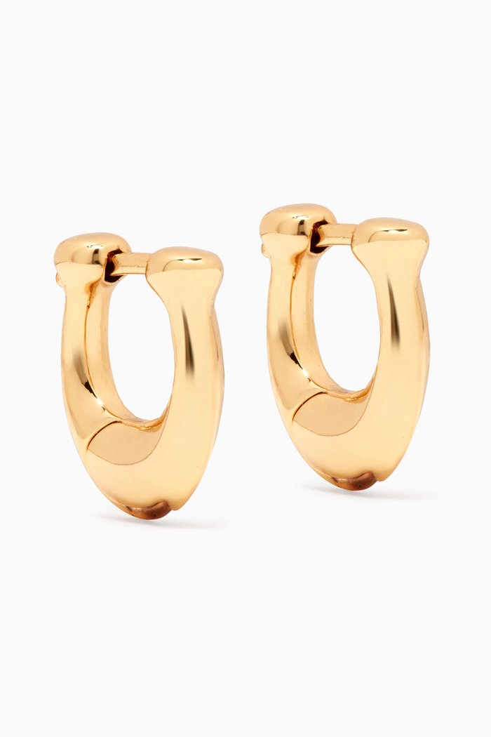 

Signature C Huggies in Gold-plated Brass