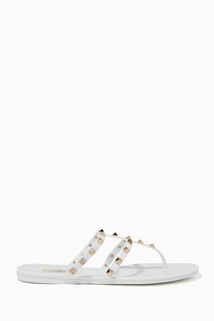 

Valentino Garavani Rockstud Flat Summer Sandals in PVC, White