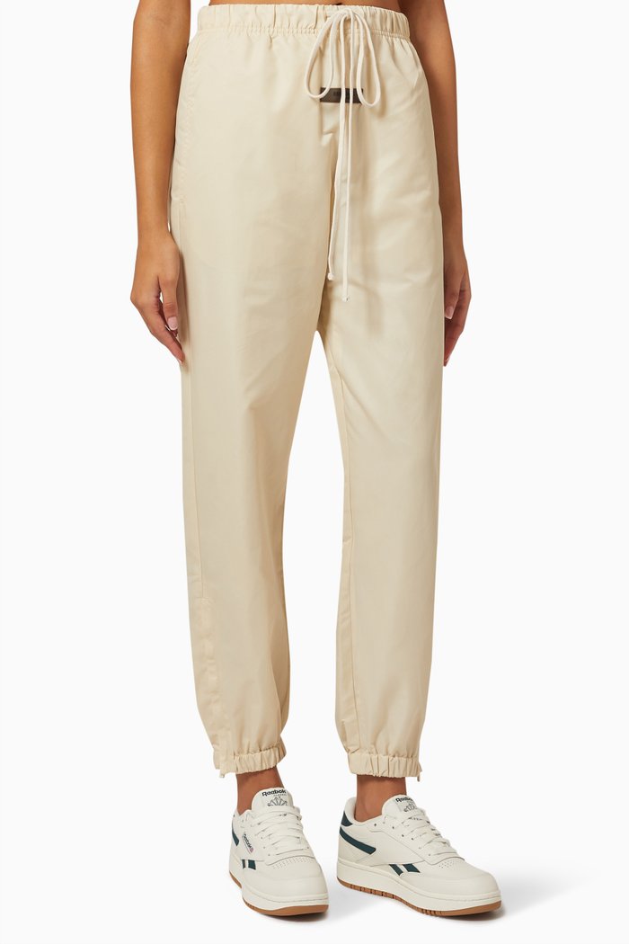 

Essentials Trackpants in Nylon, Neutral