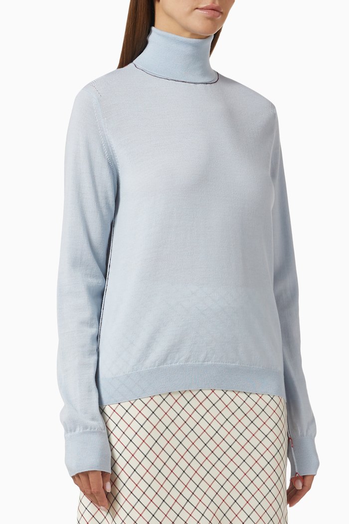 

Work-in-progress High-neck Sweater in Wool, Blue