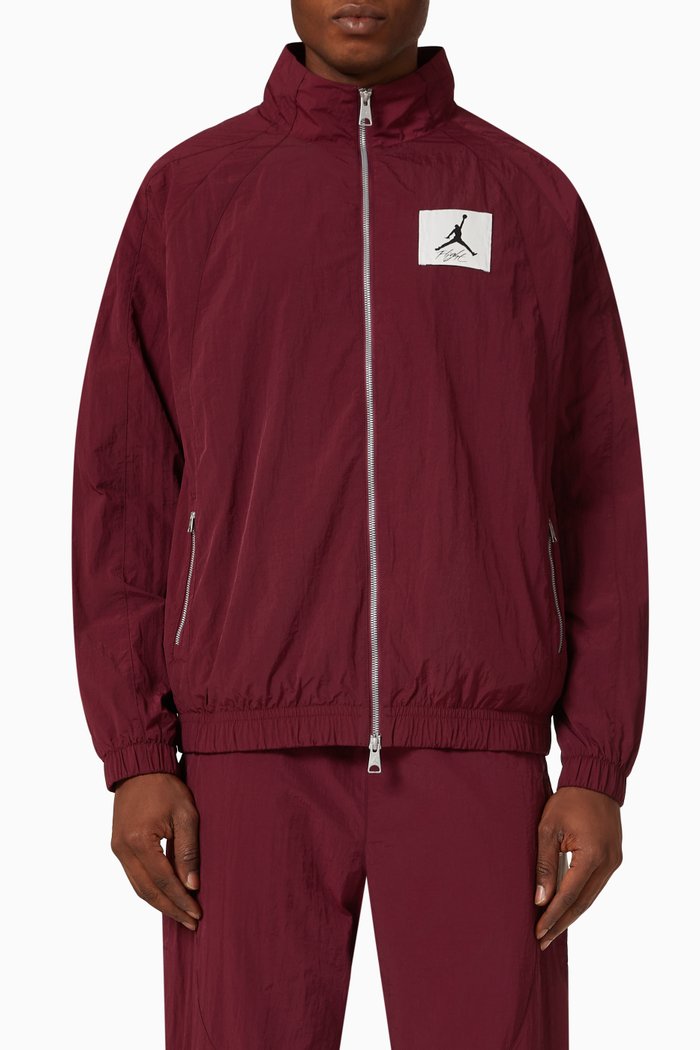 

Essentials Statement Warm-up Jacket in Nylon, Red