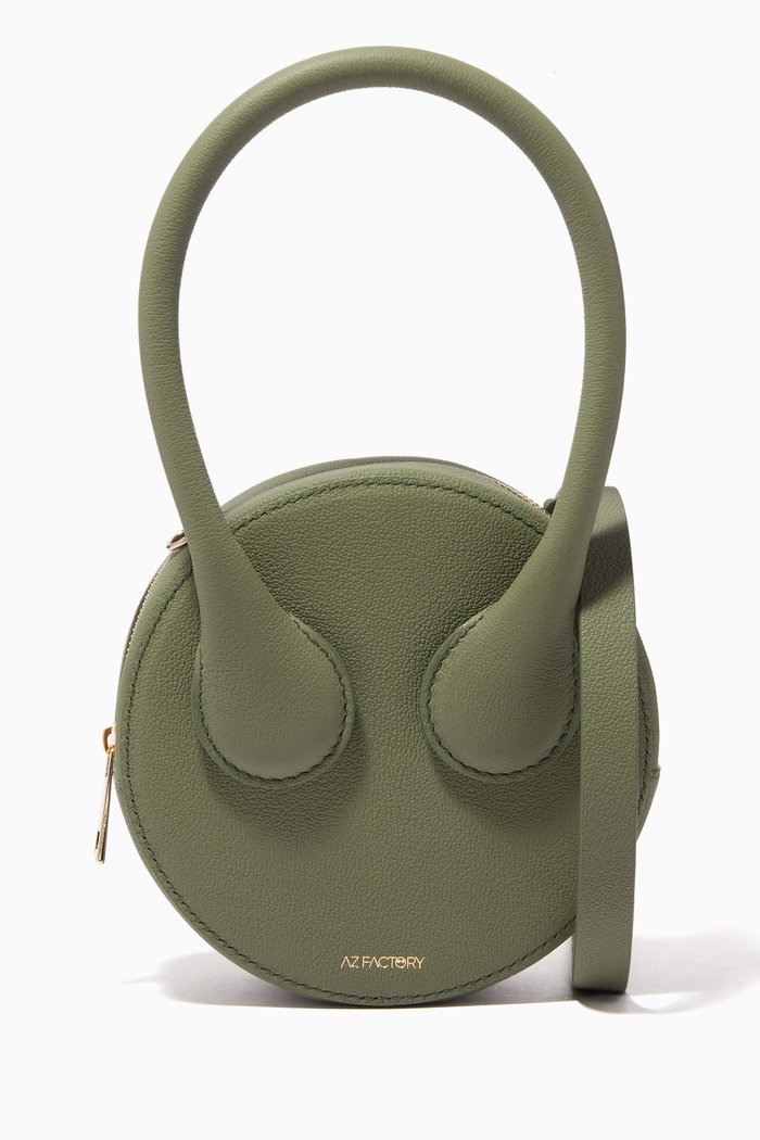 

x Ester Manas Round Cake Bag in Recycled Leather, Brown