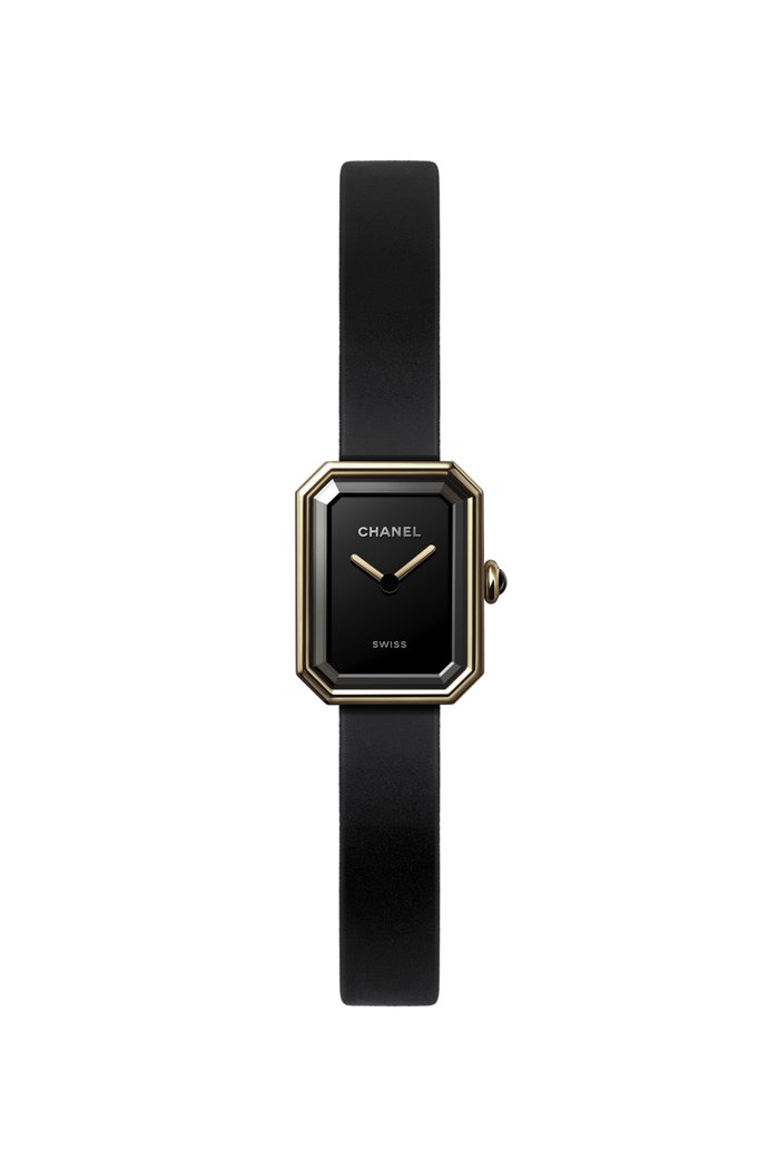

Yellow gold and titanium, black rubber with velvet touch, black lacquer dial
