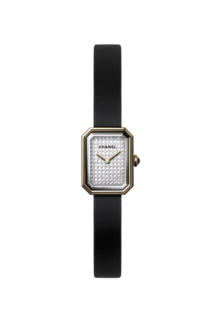 

Yellow gold and titanium, black rubber with velvet touch, diamond dial