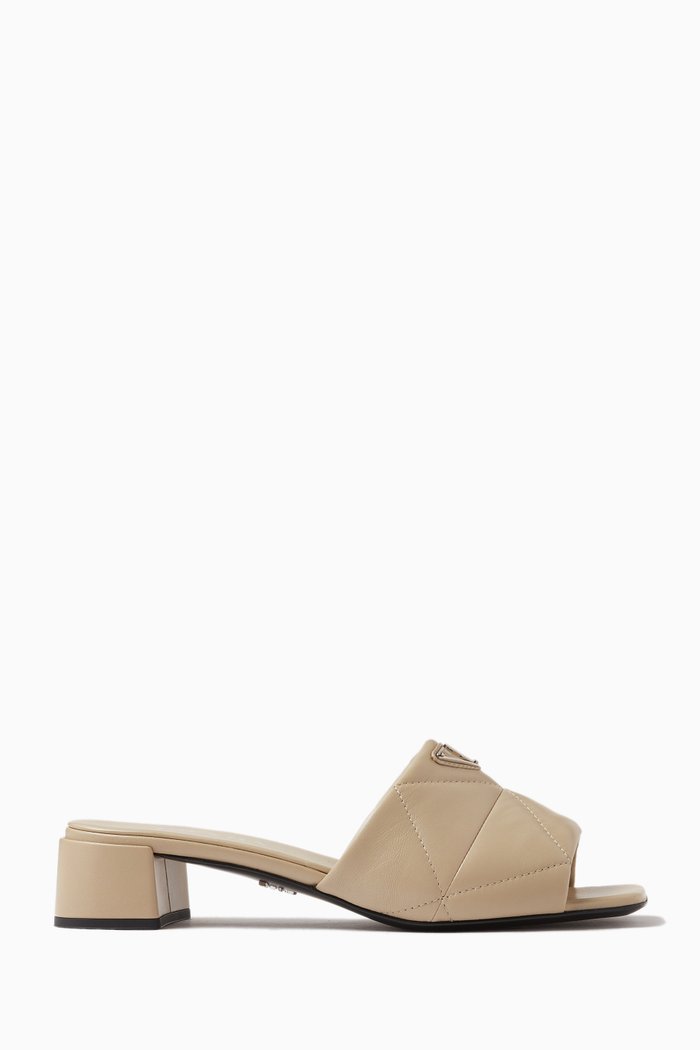 

Triangle Logo Quilted 35 Mules in Nappa, Neutral