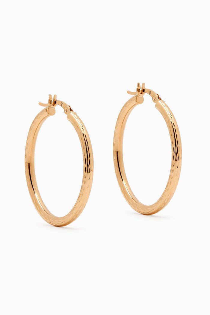 

Medium Diamond Cut Hollow Hoops in 14kt Yellow Gold
