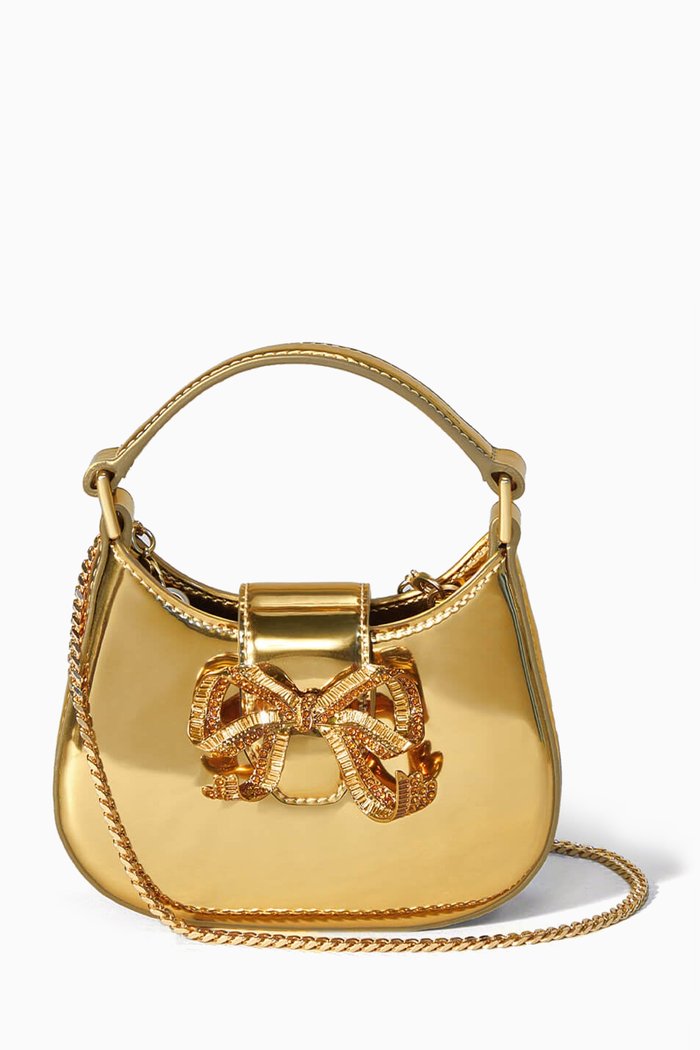 

The Crescent Micro Bow Bag in Metallic Leather, Gold