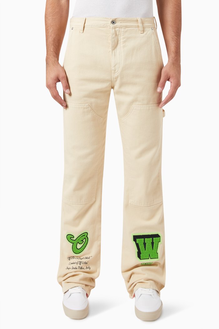 

Varsity Patch Flared Jeans in Denim, White