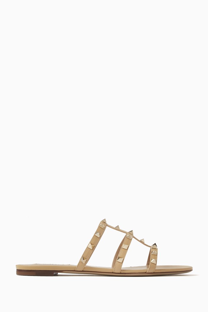 

Valentino Garavani Rockstud Slides in Leather, Neutral
