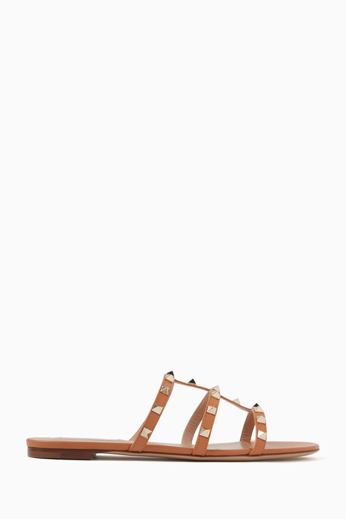 

Valentino Garavani Rockstud Slides in Leather, Brown