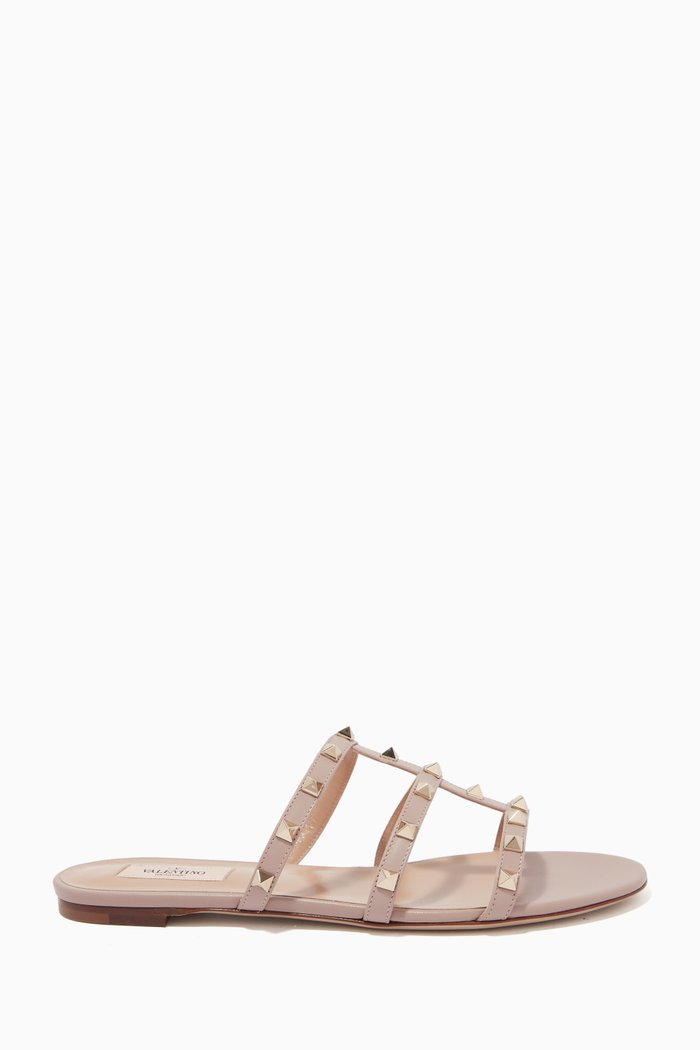 

Valentino Garavani Rockstud Slides in Leather, Neutral